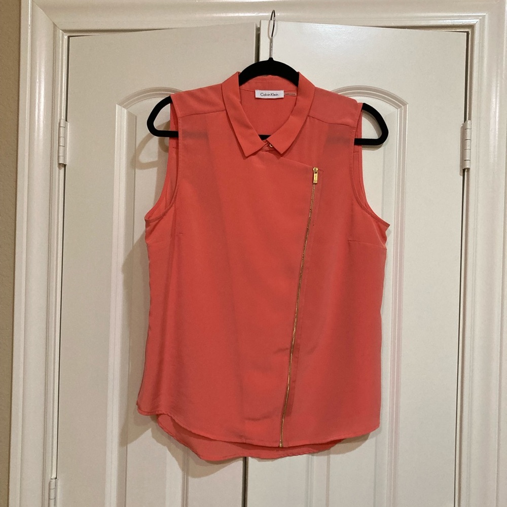 Calvin Klein blouse in peach with gold tone zippered front closure and collar